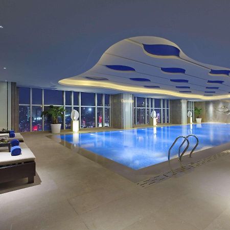 Отель Pullman Yantai Center Экстерьер фото