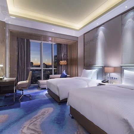 Отель Pullman Yantai Center Экстерьер фото