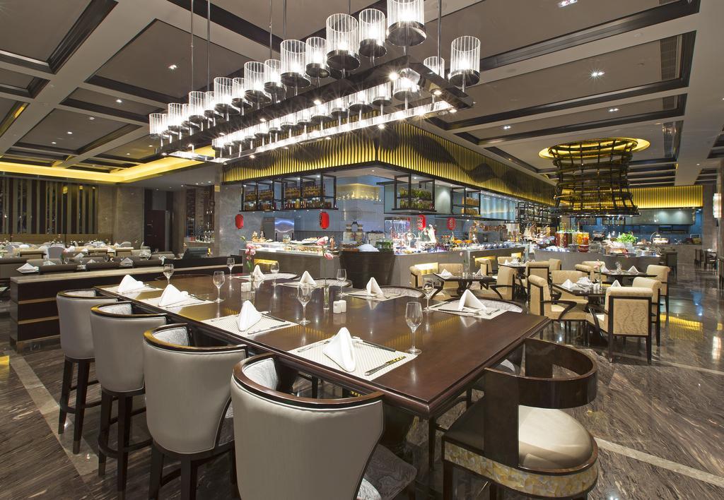 Отель Pullman Yantai Center Экстерьер фото