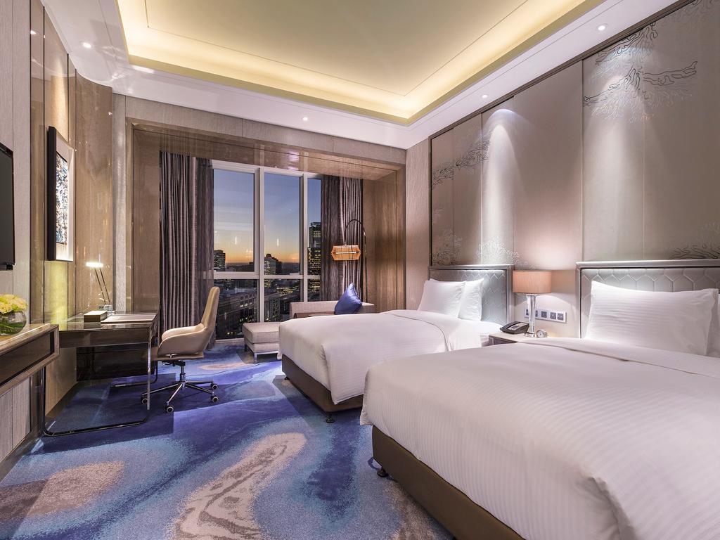 Отель Pullman Yantai Center Экстерьер фото