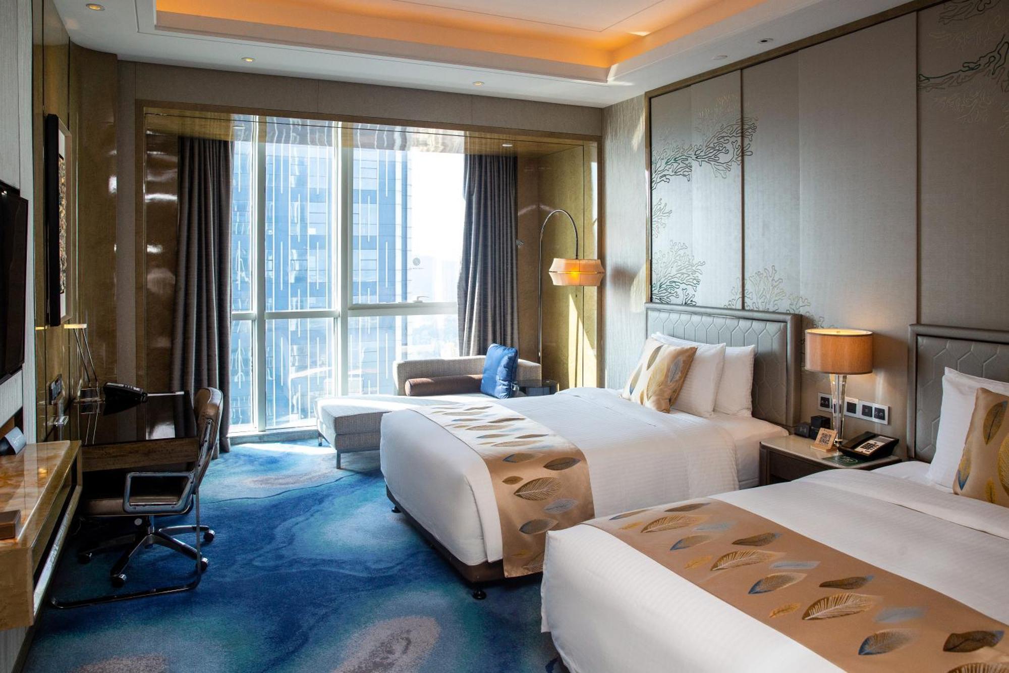Отель Pullman Yantai Center Экстерьер фото