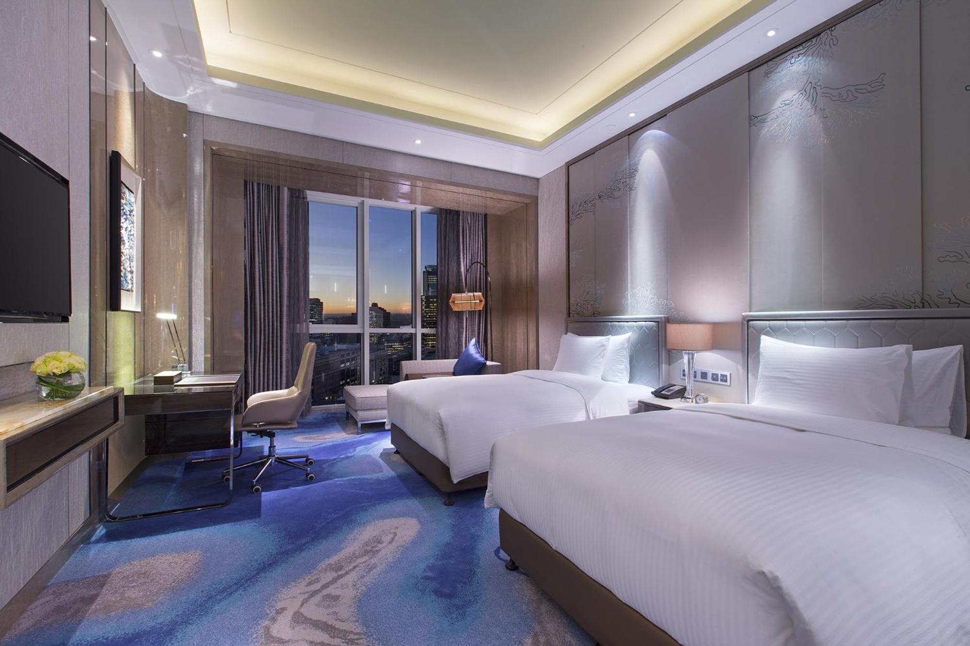 Отель Pullman Yantai Center Экстерьер фото